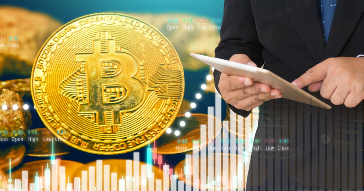 businessman investing in crypto like Bitcoin on stock market background