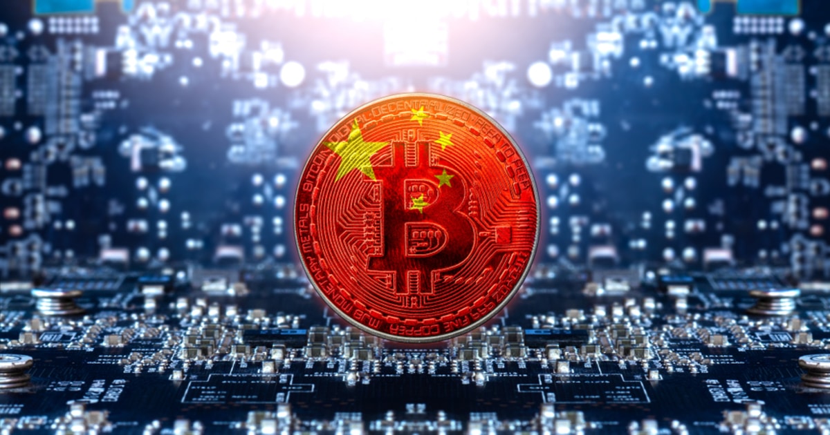 Bitcoin cryptocurrency with a China flag print on circuit board