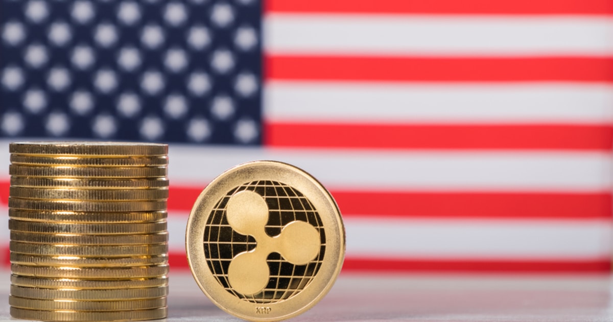 Ripple XRP coins with a US flag as a background