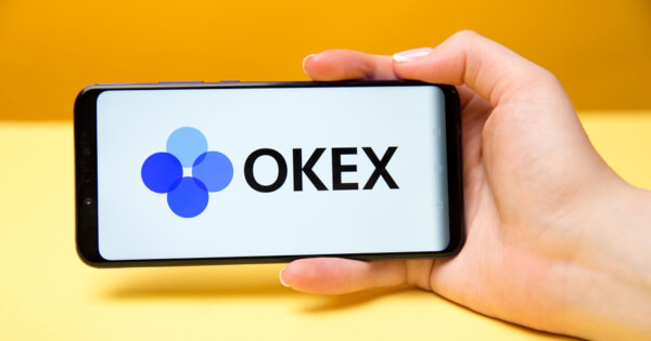 OkEx crypto exchange accessed through a smartphone
