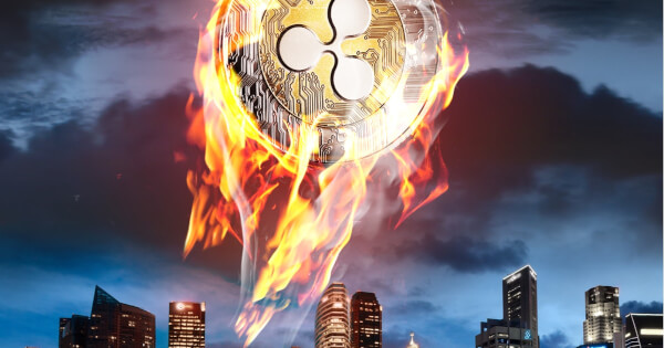 Ripple token blazing atop a city