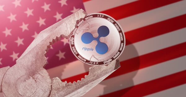 Ripple cryptocurrency faced with pressure on US flag background